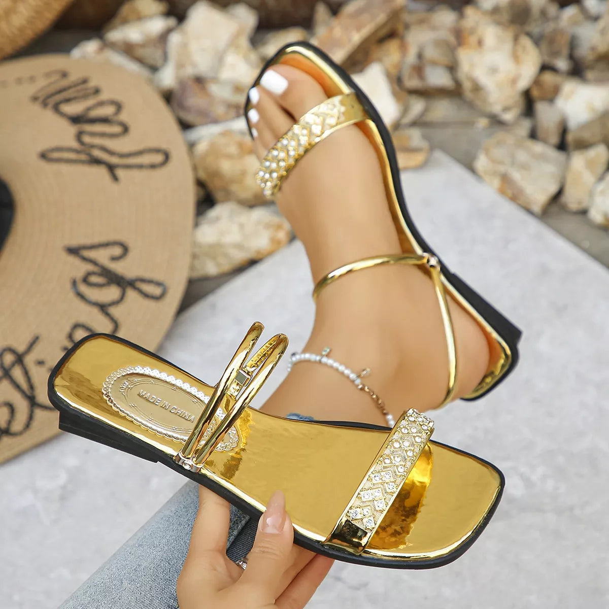 Rhinestone embellished flat sandals from Shopimist with open toe design and decorative straps, perfect for casual summer wear.