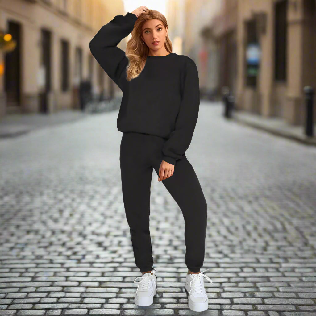 Women's solid color round neck sweatshirt and pants set by Plush Fashion Hub, casualwear with a comfortable fit.