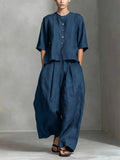 FitiqueFit three-quarter sleeve shirt and loose trousers two-piece set, featuring a stylish top and comfortable wide-leg pants.