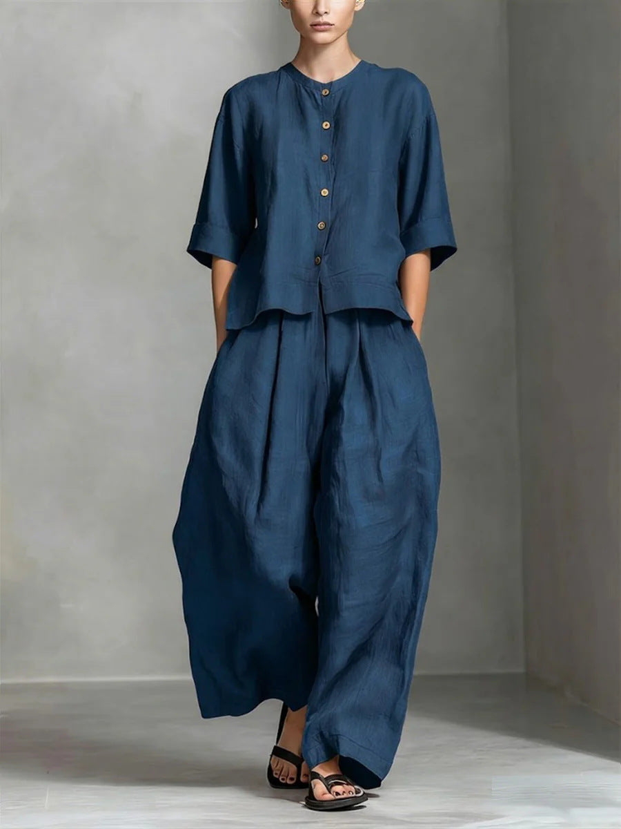FitiqueFit three-quarter sleeve shirt and loose trousers two-piece set, featuring a stylish top and comfortable wide-leg pants.