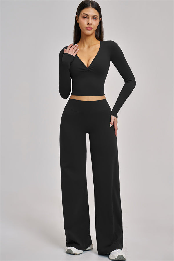 Fitglutes Activewear long sleeve crop top with fitted design, perfect for gym and workout sessions.
