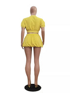 Shopimist zip-up crop top and shorts set featuring a fitted crop top with a front zipper and matching high-waist shorts.