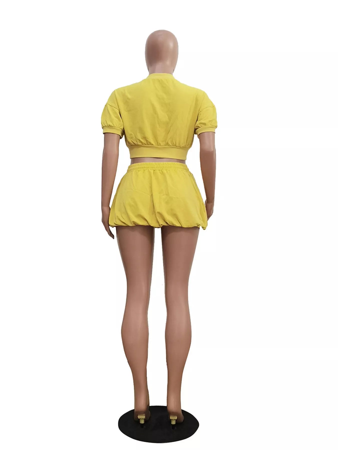 Shopimist zip-up crop top and shorts set featuring a fitted crop top with a front zipper and matching high-waist shorts.