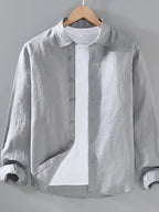 Men's plus size button-up long sleeve shirt by Shopimist, shown in a classic design with collar and button details.