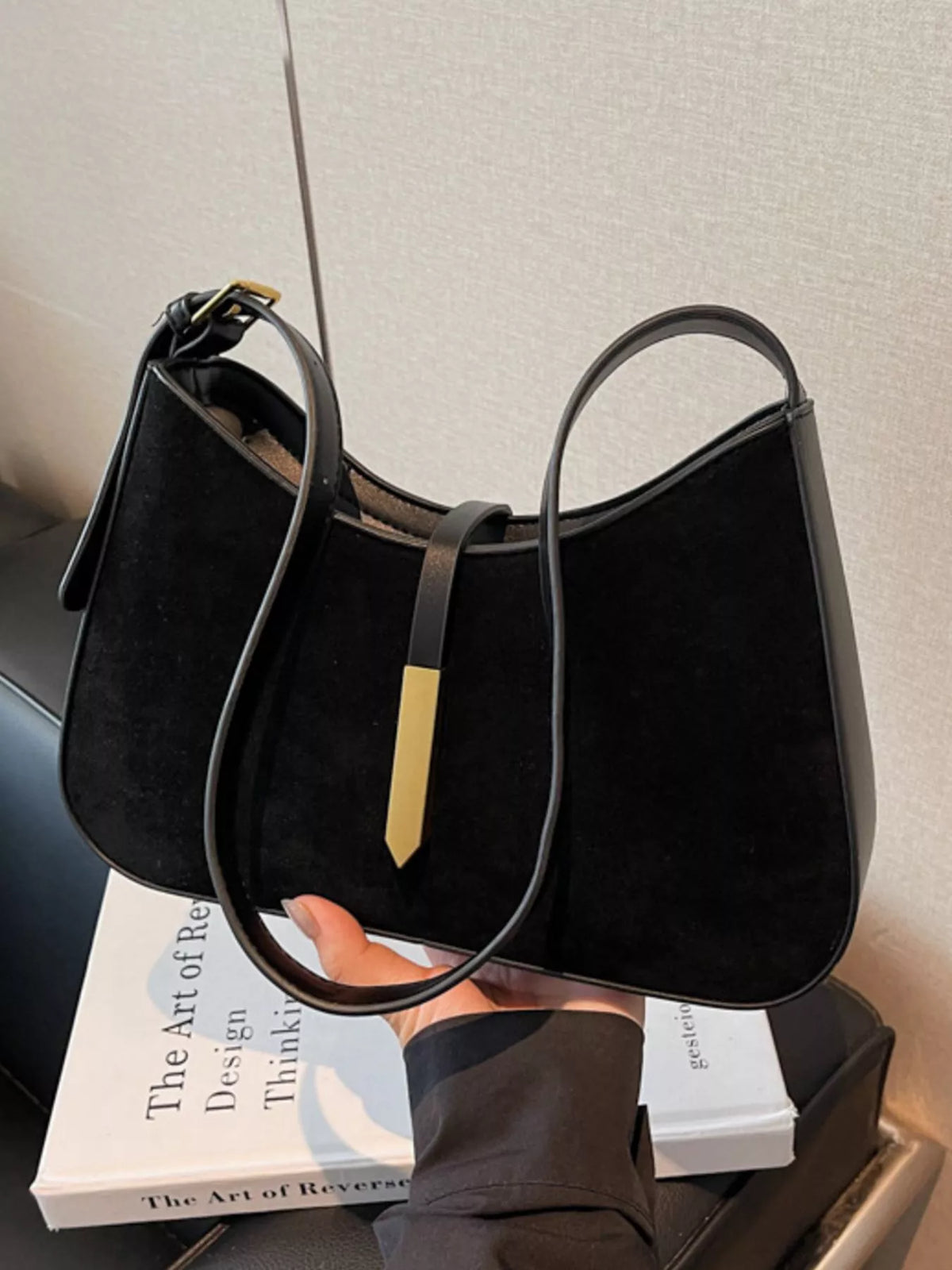 Simply Love adjustable strap shoulder bag with a sleek design, featuring a spacious interior and durable strap for everyday use.