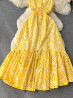 Eyelet embroidered tiered camisole dress from Trendsi, a stylish summer boho midi dress with eyelet details and layered design.