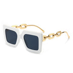 Square chain sunglasses for women by Plush Fashion Hub featuring bold square frames and stylish chain accents.