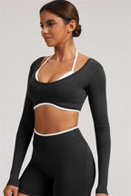 Fitglutes Activewear long sleeve crop top and leggings 2-piece set, suitable for gym and workout, in stylish athletic fabric.