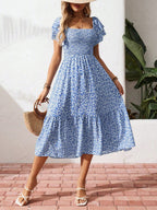 Floral print smocked ruffle sleeve midi dress by Trendsi, lightweight summer dress with a flowy silhouette and feminine details.