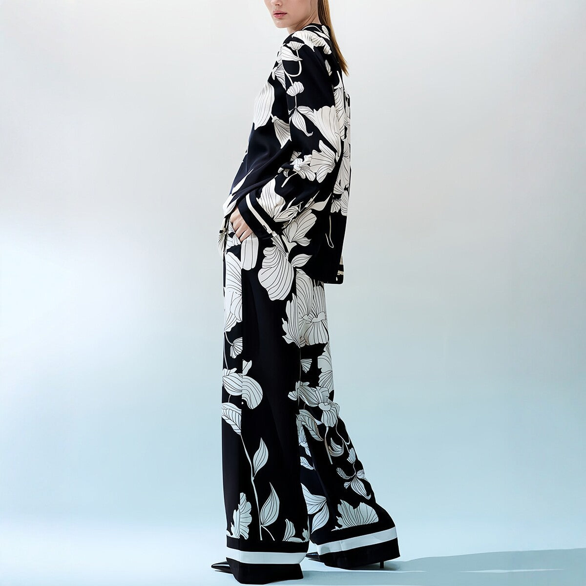 Black and white floral two-piece set with tops from eprolo, featuring a stylish floral pattern and casual fit.