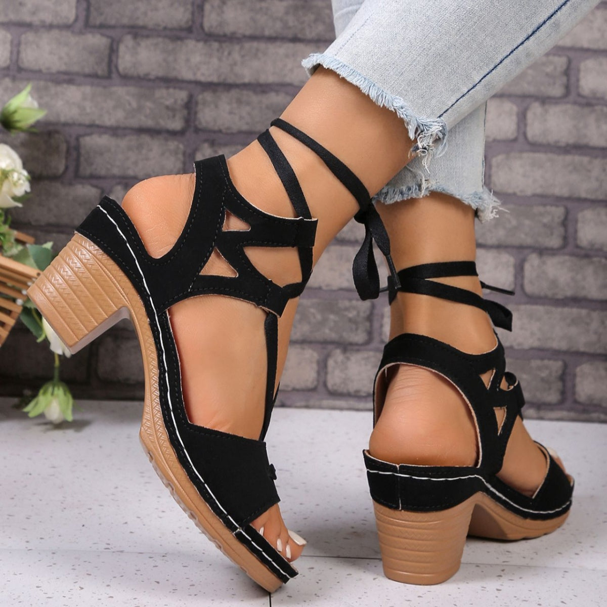 Women's chic lace-up block heel sandals with strappy design and mid-height heel, stylish footwear by Trendsi.