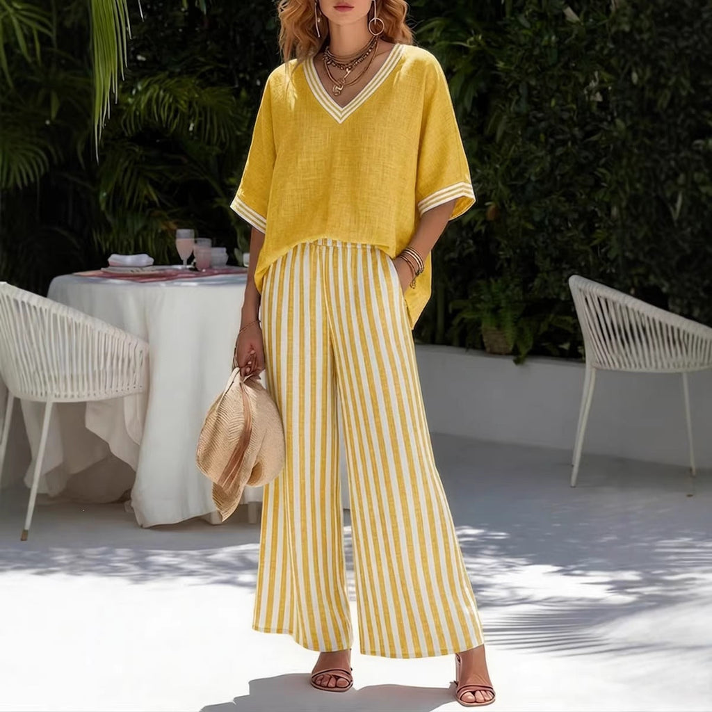 Women's striped tunic top and casual trousers two-piece set by FitiqueFit, featuring a relaxed fit and stylish casualwear.