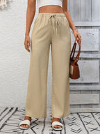 Women’s high-waisted wide-leg drawstring pants in soft breathable viscose, stylish and comfortable trendy pants.
