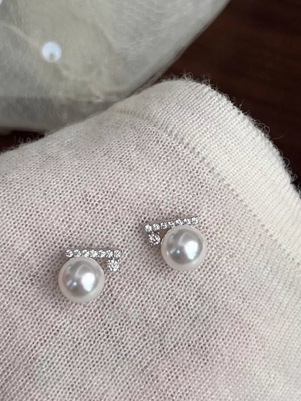 Zircon and pearl stud earrings from Plush Fashion Hub featuring sparkling zircon stones and elegant pearl accents.