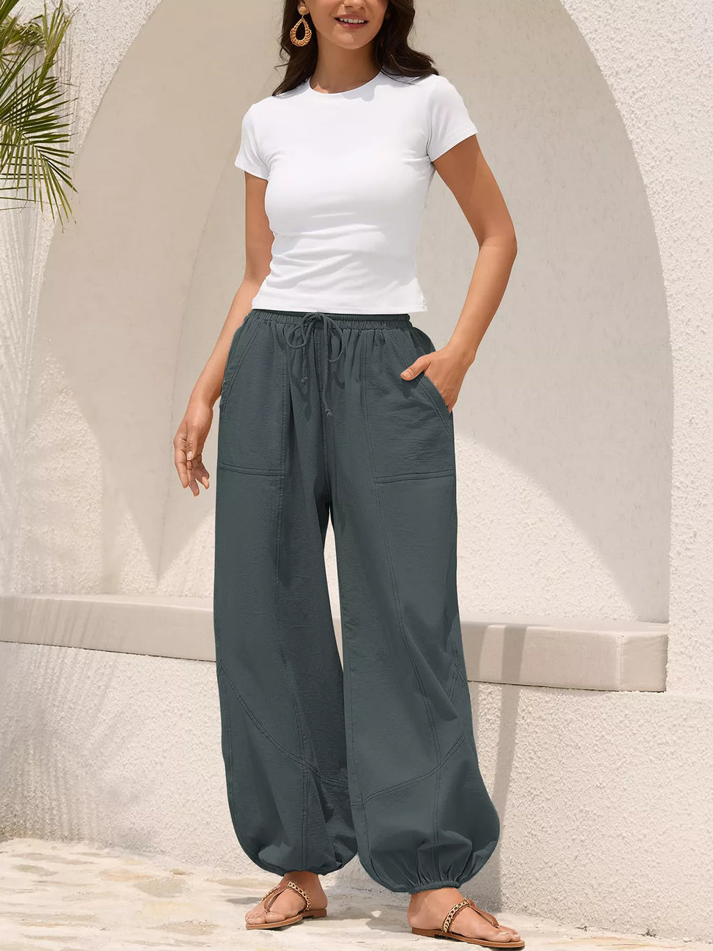 Casual loose fit harem joggers with drawstring waist by Trendsi, featuring relaxed fit and comfortable style in soft fabric.