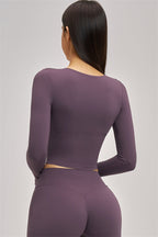 Fitglutes Activewear long sleeve crop top from The Swoon collection, featuring a fitted style and breathable fabric.