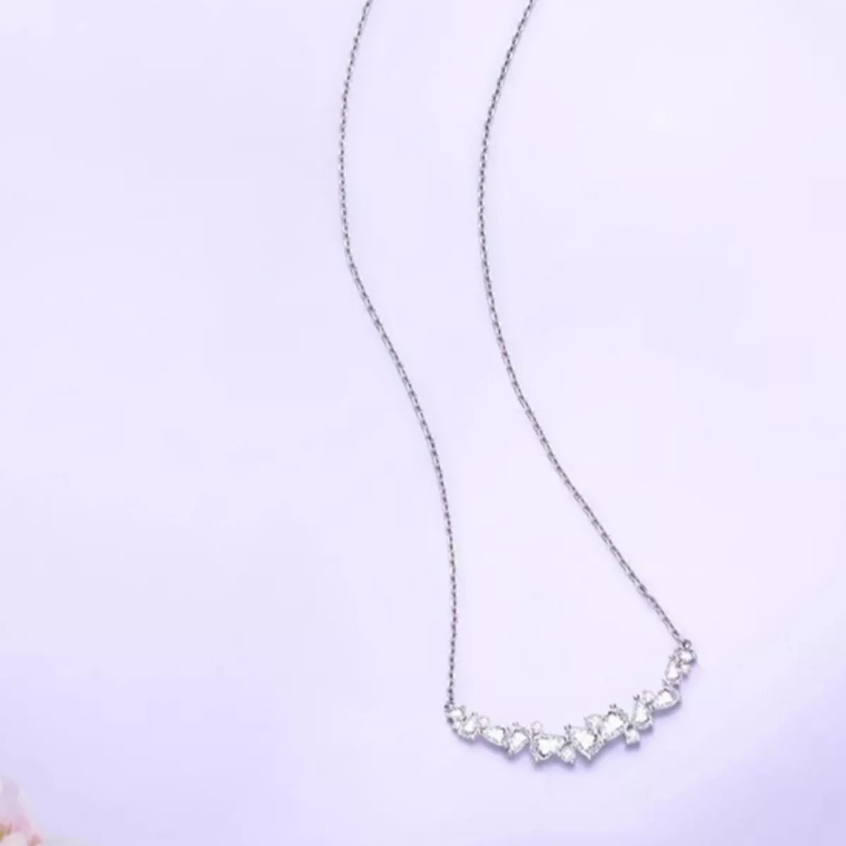Sterling silver zircon necklace with delicate chain and sparkling stones, stylish jewelry from Plush Fashion Hub.