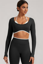 Fitglutes Activewear long sleeve crop top and matching leggings 2-piece set, stylish gym and workout clothes for women.