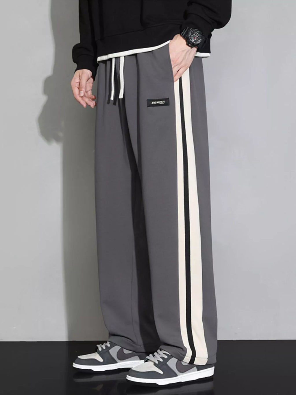 Plus size men's casual loose pants with side stripes from Shopimist, featuring a relaxed fit and stylish stripe design.