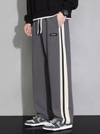 Plus size men's casual loose pants with side stripes from Shopimist, featuring a relaxed fit and stylish stripe design.