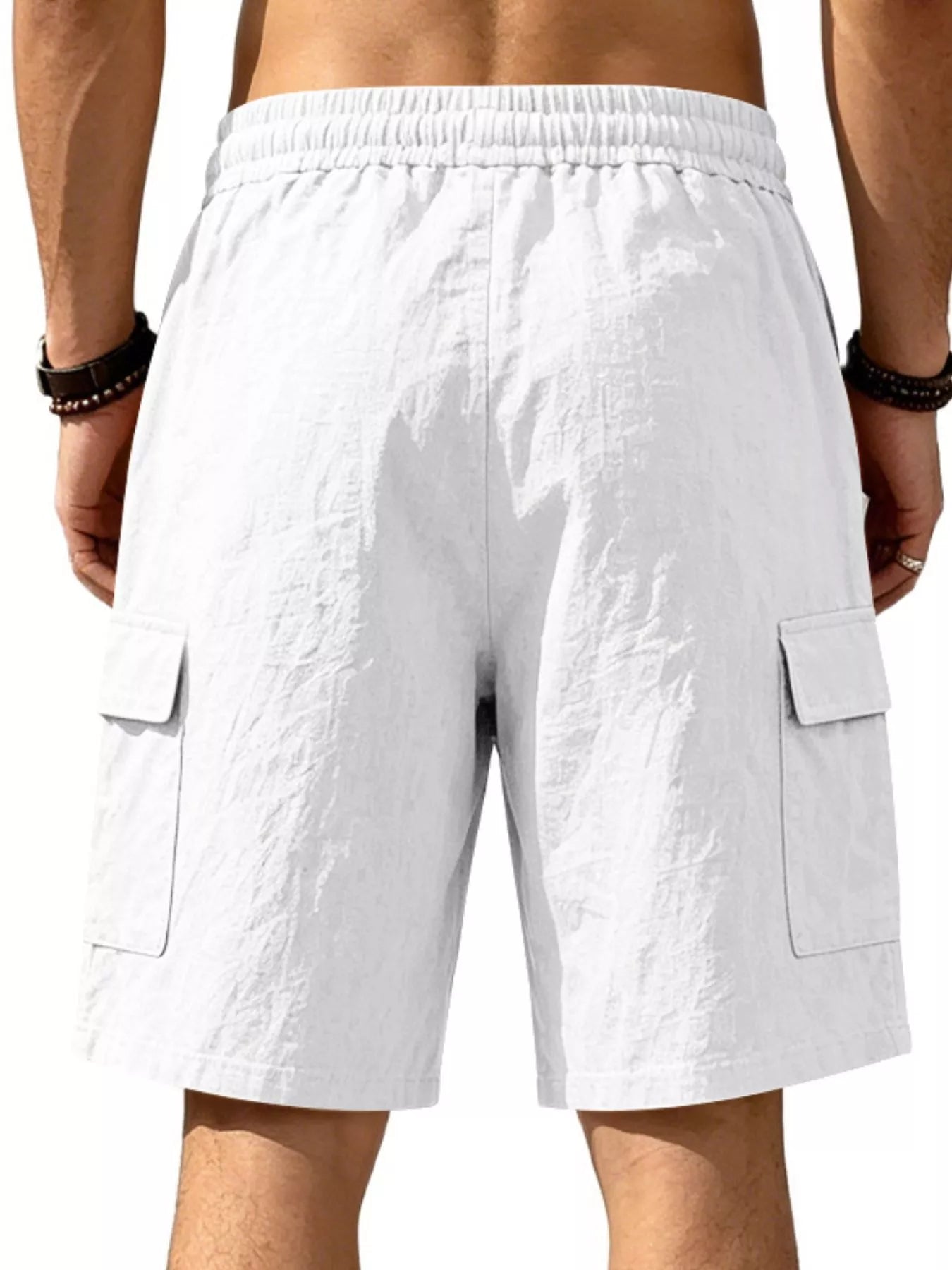 Men's plus size casual cargo shorts with drawstring waist, black fabric, multiple pockets, and relaxed fit by Trendsi.