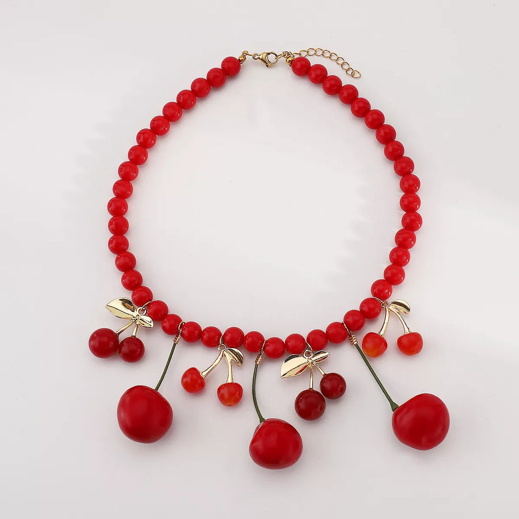 Cherry charm beaded statement necklace featuring red cherry pendants and colorful beads, stylish jewelry by Shopimist.