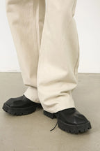 Men's baggy jeans with pockets from Trendsi, featuring a relaxed fit and multiple front and back pockets, casual streetwear style.