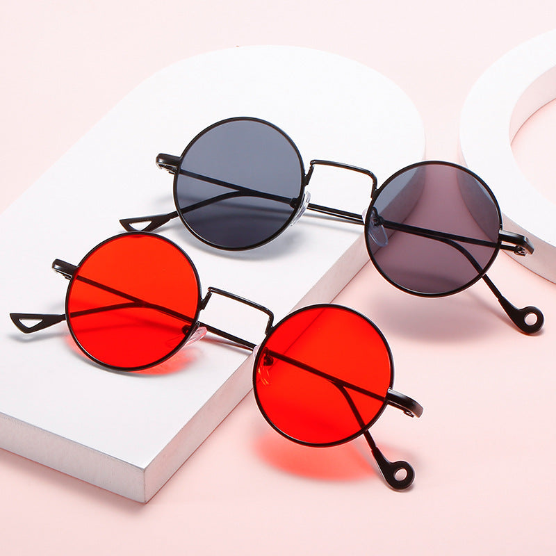 Retro round gothic sunglasses from FitiqueFit with steampunk-inspired design and vintage metal frames.