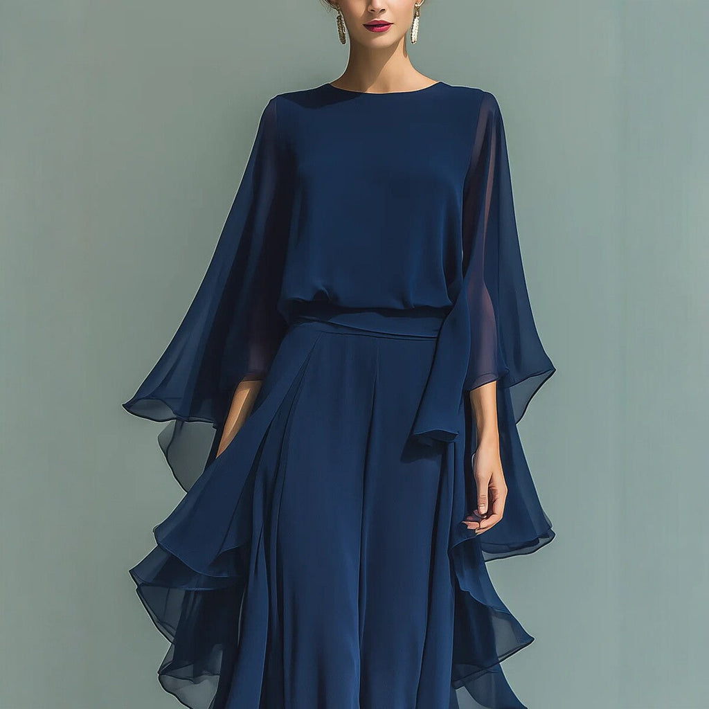 Deep Blue ruffle wide-leg pants set by FitiqueFit featuring a two-piece design with batwing sleeves, elegant and stylish for women.