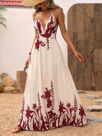 Elegant floor-length deep V-neck spaghetti strap evening maxi dress by Plush Fashion Hub, shown with flowing fabric and stylish design.