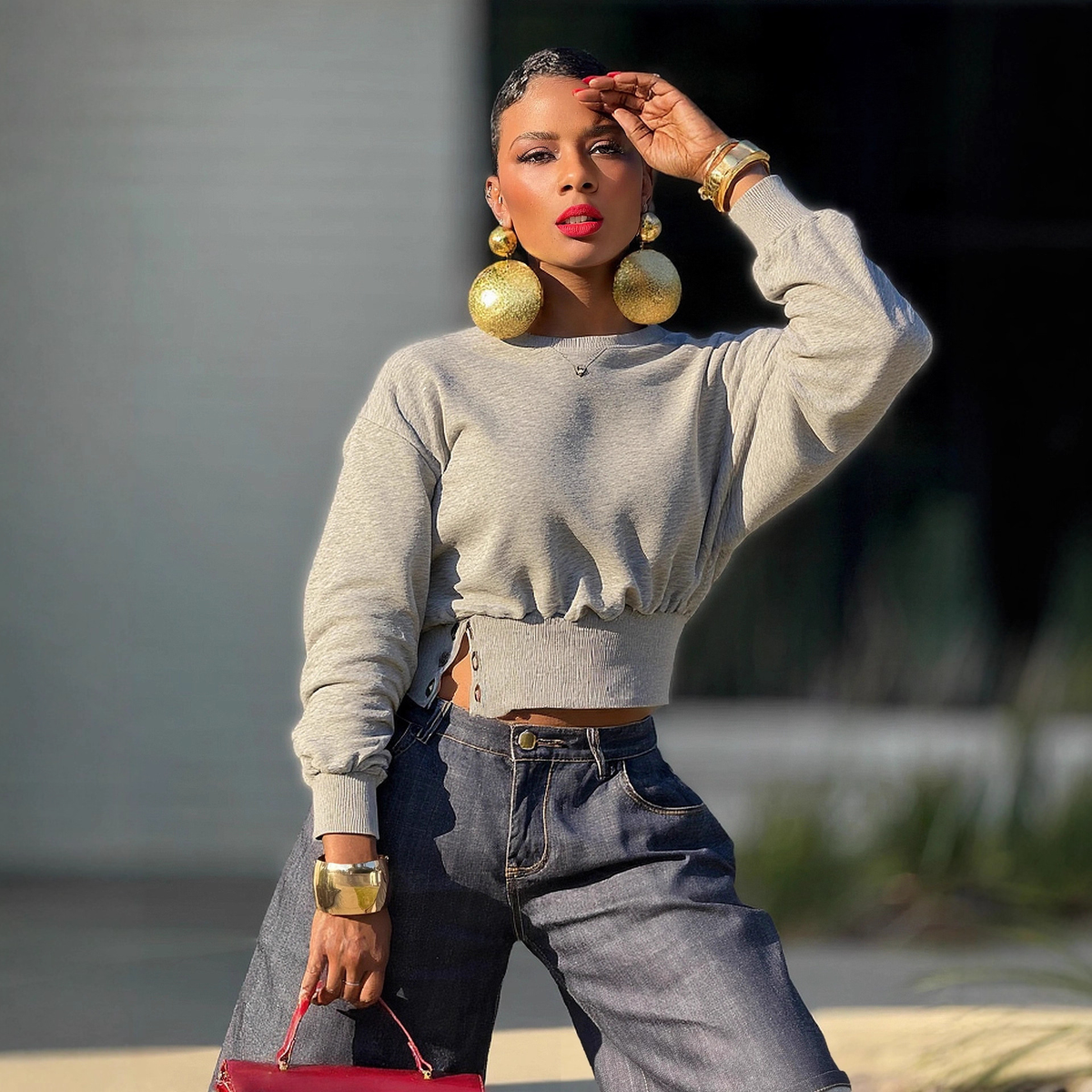 Eprolo short crop hoodie with side buttons, waist cinching, and round neck, shown in a stylish, fitted design.