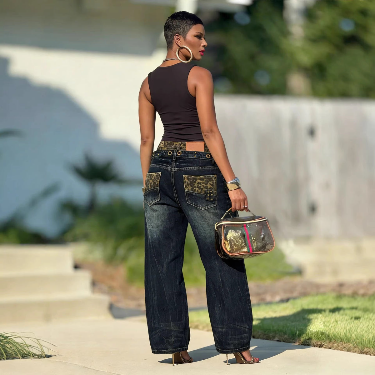 Eprolo distressed washed denim pants with leopard print waistband and pattern, stylish casual jeans for women or men.