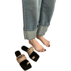 Eprolo minimalist soft leather square toe slide sandals showing beige straps and sleek design on a neutral background.