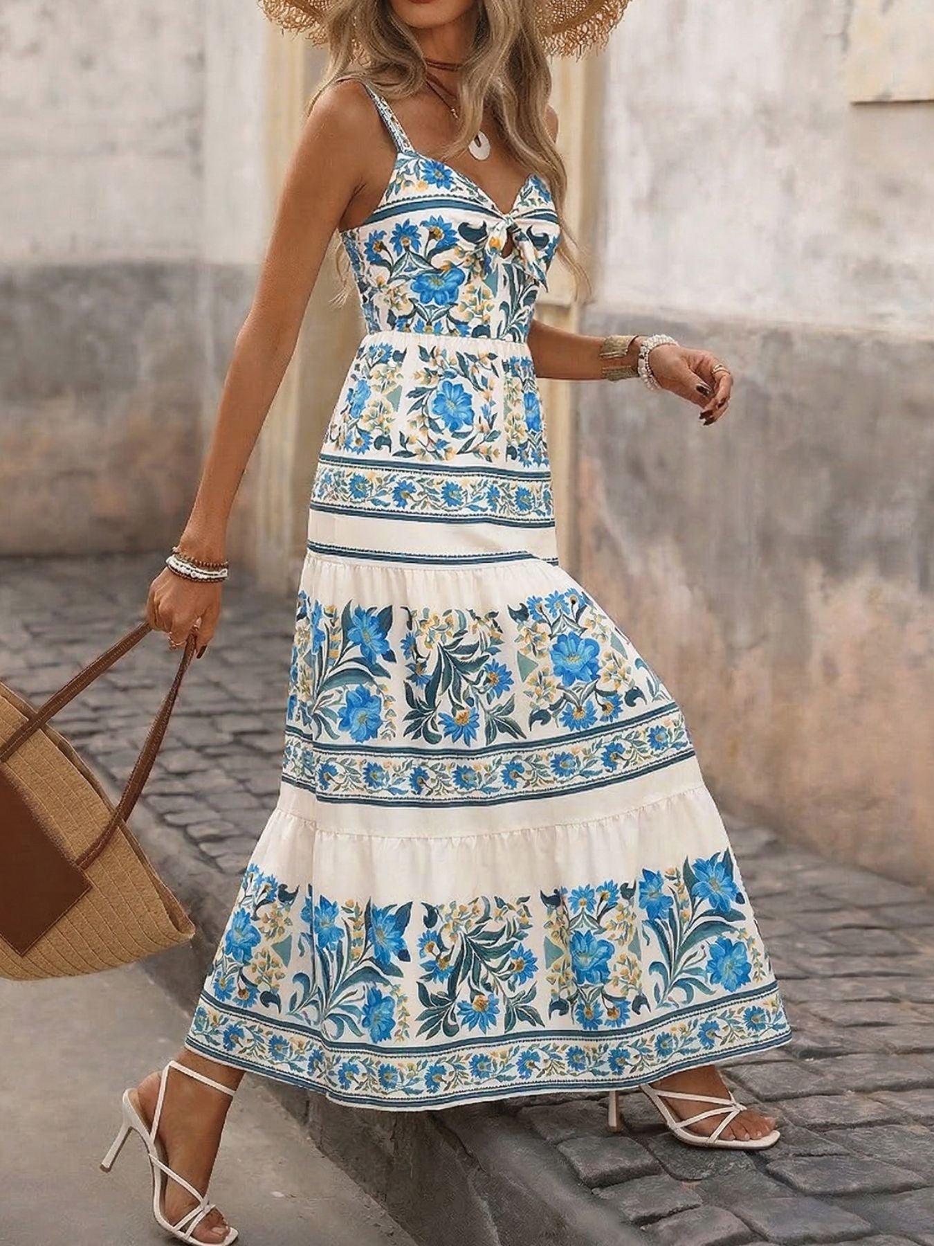 Floral print smocked sweetheart neckline maxi dress by Trendsi, lightweight summer dress with a flowing silhouette and vibrant floral pattern.