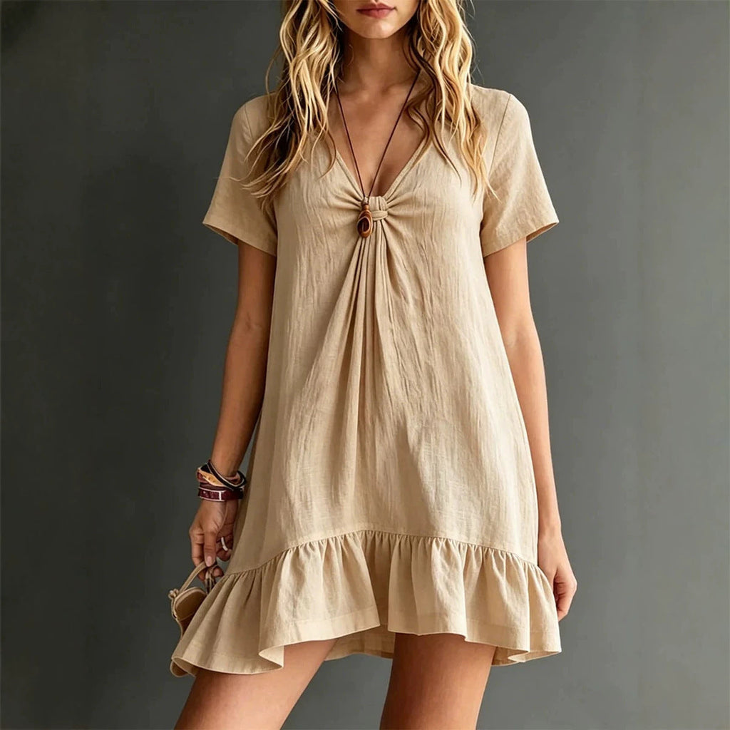 Women's FitiqueFit ice silk crepe V-neck midi dress with short sleeves, loose fit, casual style, shown hanging on a mannequin.