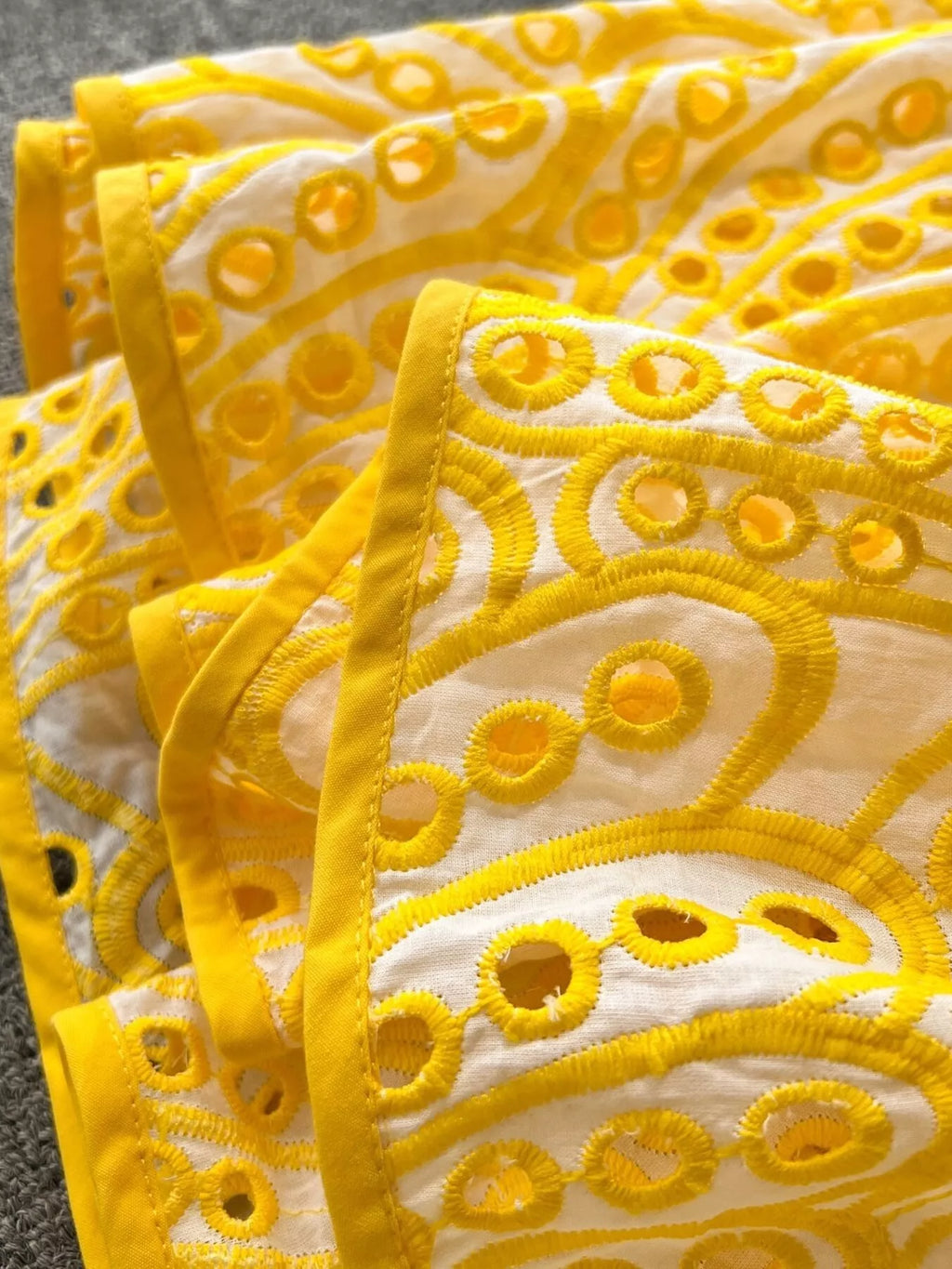Eyelet embroidered tiered camisole summer boho midi dress by Trendsi, featuring lightweight fabric and layered design.