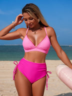 High-waisted bikini set with scalloped trim from Trendsi, stylish two-piece swimwear featuring vibrant colors and a flattering fit.