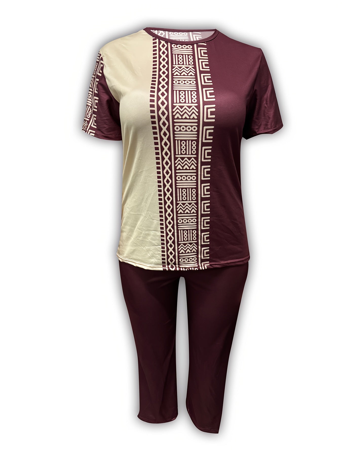 Plus size ethnic print casual two-piece women’s outfit by Plush Fashion Hub, featuring vibrant patterns and comfortable fit.
