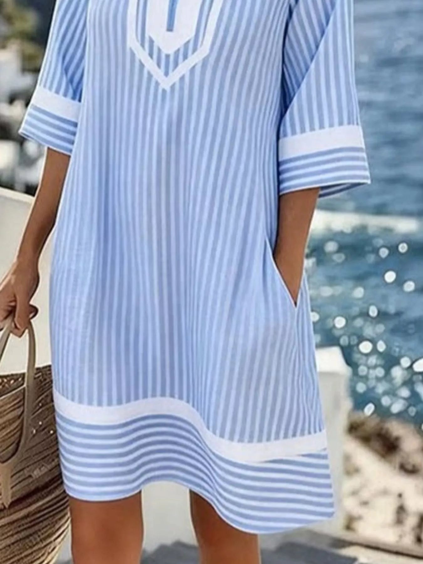 Plus size full striped V-neck casual dress by Plush Fashion Hub, featuring a comfortable fit and stylish vertical stripes.