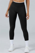 Fitglutes Activewear long sleeve crop top and matching leggings set, designed for workouts, in vibrant athletic fabric.