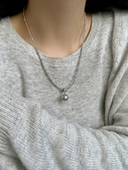 Shopimist pearl pendant necklace featuring a single round pearl on a delicate chain, elegant jewelry for special occasions.