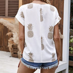 Women's casual pineapples print round neck roll sleeve top by FitiqueFit, shown in a vibrant, relaxed-fit design.
