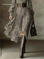 Floral printed long sleeve ruffled midi dress by Trendsi, perfect for fall, featuring a feminine design and elegant floral pattern.