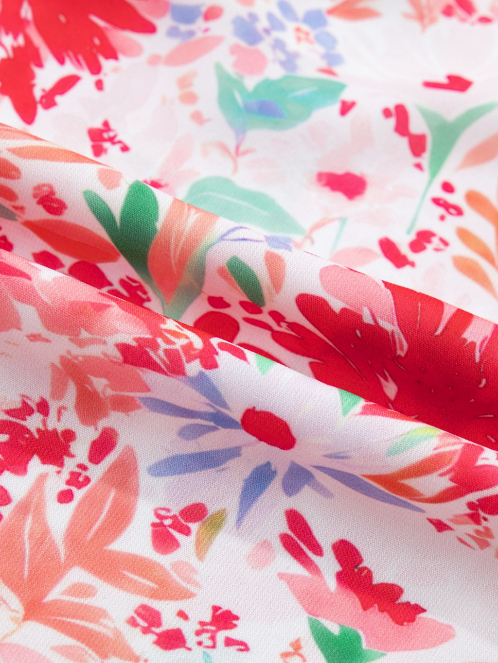 Floral print tie-shoulder midi dress by Trendsi featuring pockets, lightweight summer dress with a flowing silhouette and summer floral pattern.