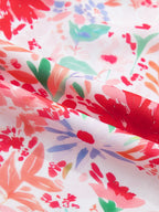 Floral print tie-shoulder midi dress by Trendsi featuring pockets, lightweight summer dress with a flowing silhouette and summer floral pattern.