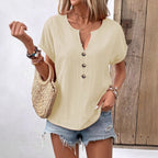 Women's buttoned V-neck short-sleeve T-shirt top by Plush Fashion Hub, featuring a fitted design and casual style.