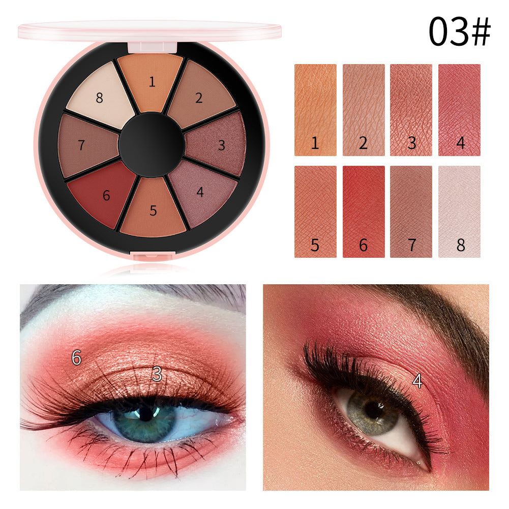 Round pink eyeshadow palette with eight numbered shades ranging from beige to red, swatch samples, and eye makeup applications.