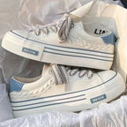 Women’s platform canvas sneakers by FitiqueFit featuring chunky design and height-increasing trainers with white laces and rubber soles.