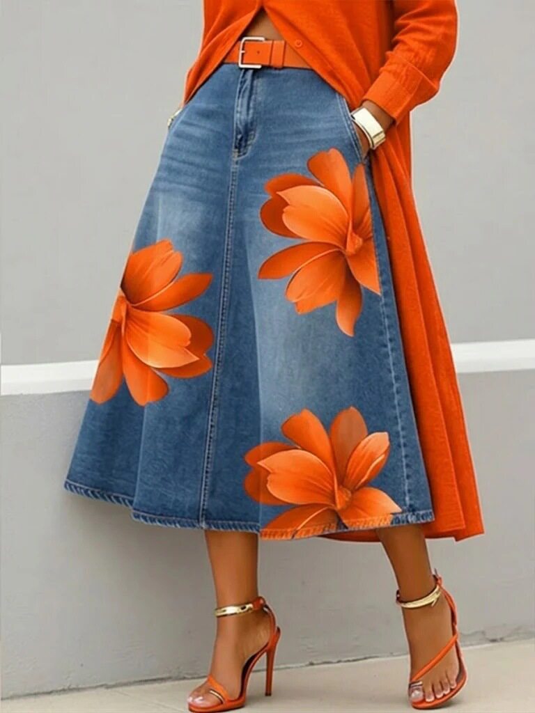 Women's floral print A-line midi skirt by Plush Fashion Hub featuring denim-style fabric and boho-inspired design.