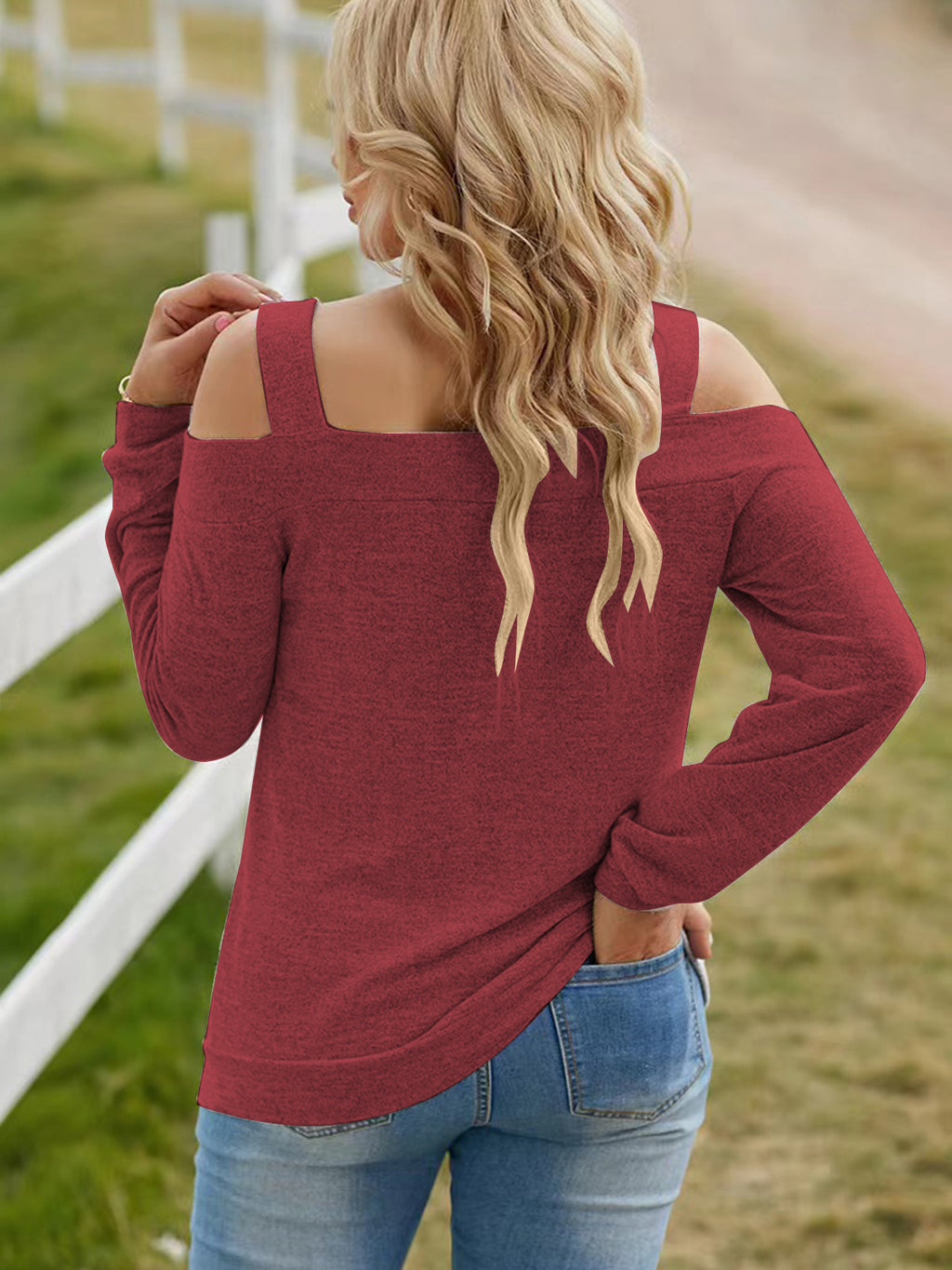Women's elegant cold shoulder blouse with cutout details, chic casual polyester top by Trendsi, stylish and comfortable for everyday wear.